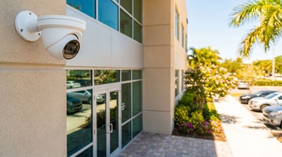 4K commercial security camera mounted on a Florida office building exterior